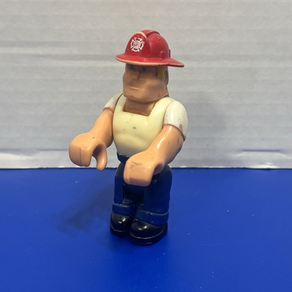 Vintage 1977 Fisher Price Husky Helper Fireman